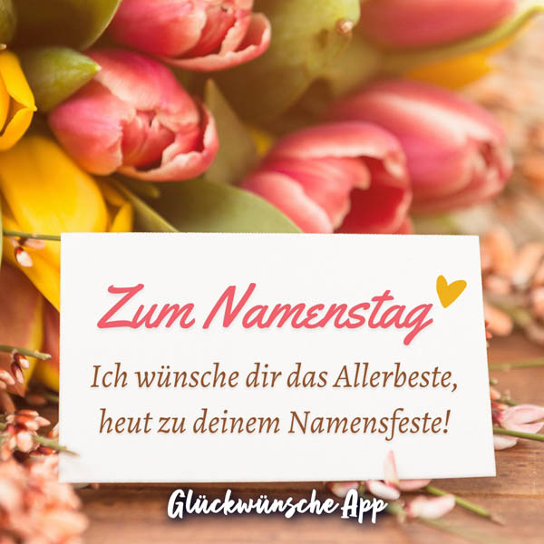 Blumen und Karte mit Text: „Zum Namenstag. Ich wünsche dir das Allerbeste, heut zu deinem Namensfeste!"