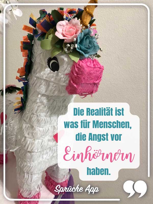 Einhorn aus Papier mit Spruch „Die Realität ist was für Menschen, die Angst vor Einhörnern haben."