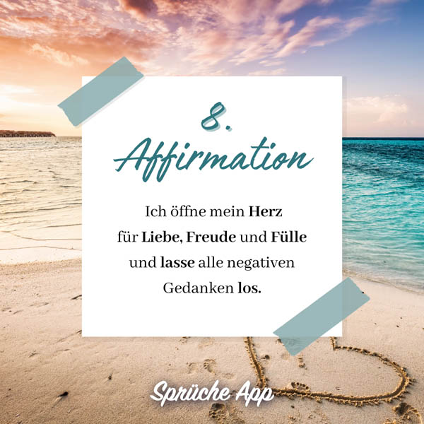 Strand mit Herz im Sand und Spruch: Ich öffne mein Herz für Liebe, Freude und Fülle und lasse alle negativen Gedanken los.