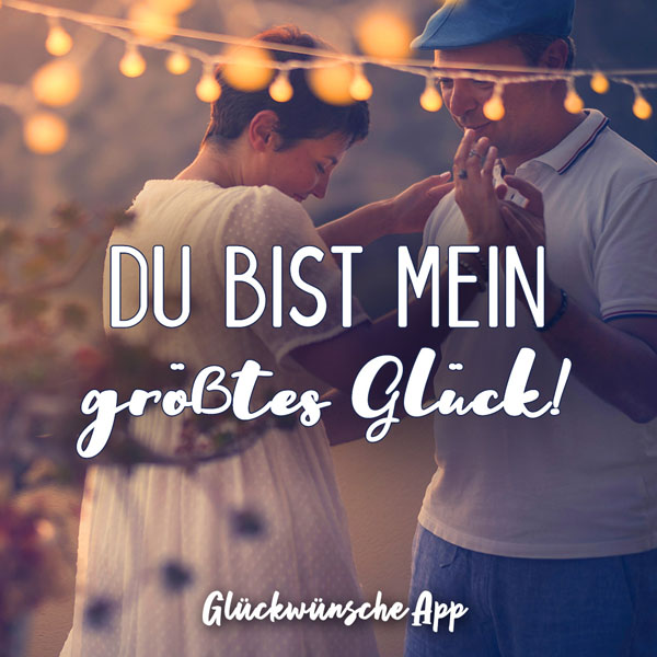 Paar, das tanzt mit Text: „Du bist mein größtes Glück!"