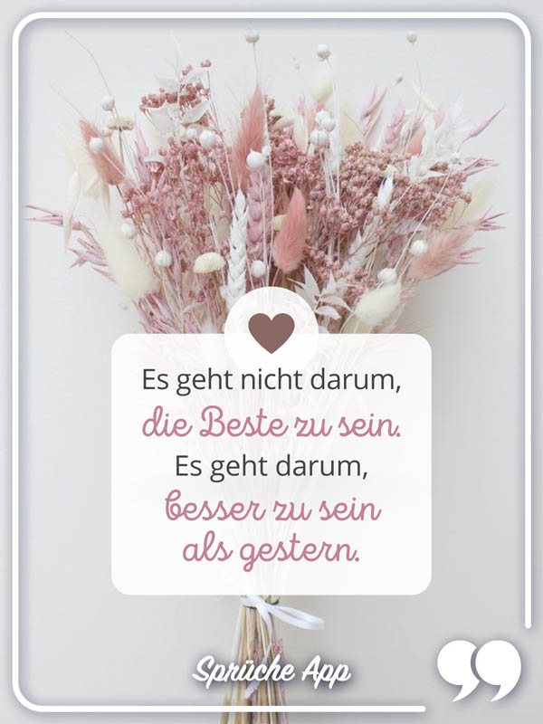 Getrocknete Blumen in einem Strauß mit Spruch: „Es geht nicht darum, die Beste zu sein. Es geht darum, besser zu sein als gestern."