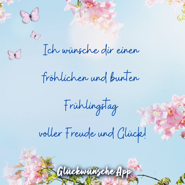 Rosa Blumen und blauer Himmel mit Frühlingsgruß: „Ich wünsche dir einen fröhlichen und bunten Frühlingstag voller Freude und Glück!"