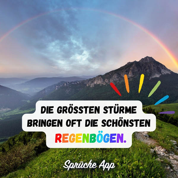 Regenbogen über einem Berg mit Spruch: „Die größten Stürme bringen oft die schönsten Regenbögen."