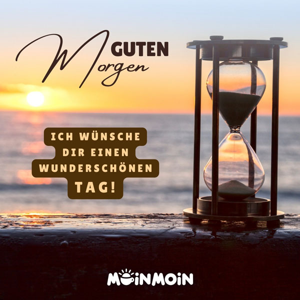 Sonnenaufgang am Meer mit Sanduhr und Gruß: „Guten Morgen. Ich wünsche dir einen wunderschönen Tag!"