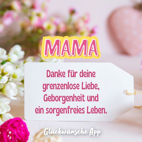 Rosa Blumen und Karte zum Muttertag mit Gruß: „Mama Danke für deine grenzenlose Liebe, Geborgenheit und ein sorgenfreies Leben."